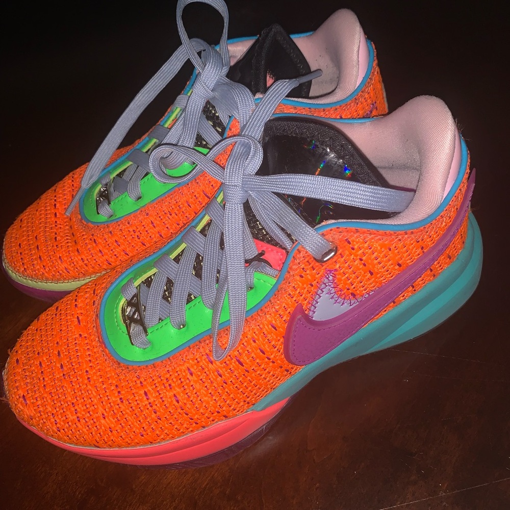 Nike Orange and Purple Sneakers with Teal Accents